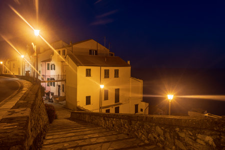 Imperia, Italy - February 22, 2020: Night scene in the old town of Imperia, seaside city on the Italian Rivieraのeditorial素材