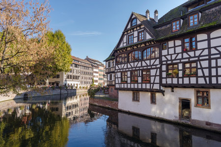 Strasbourg, France - October 25, 2021: A view across the canal to half timbered houses in Petite France district in Strasbourgのeditorial素材