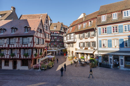 Colmar, France - October 24, 2021: View along pedestrian street in the historic center of Colmar, surrounded well-preserved half-timbered buildingsのeditorial素材