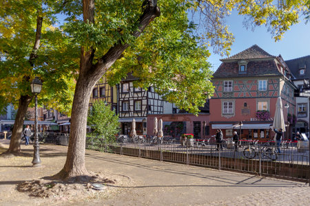 Colmar, France - October 24, 2021: View along pedestrian street in the historic center of Colmar, surrounded well-preserved half-timbered buildingsのeditorial素材
