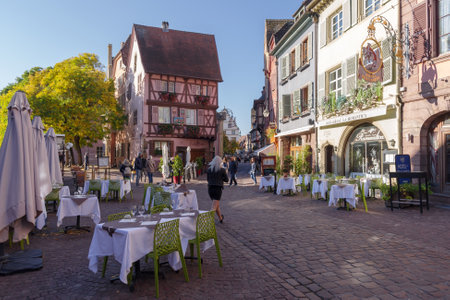Colmar, France - October 24, 2021: View along pedestrian street in the historic center of Colmar, surrounded well-preserved half-timbered buildingsのeditorial素材