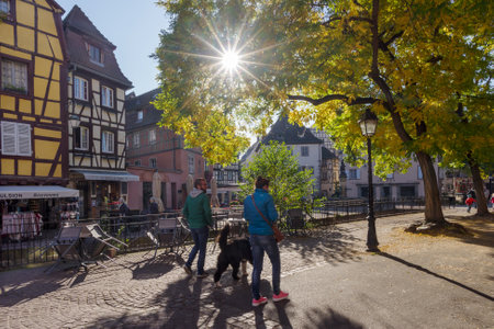 Colmar, France - October 24, 2021: View along pedestrian street in the historic center of Colmar, surrounded well-preserved half-timbered buildingsのeditorial素材