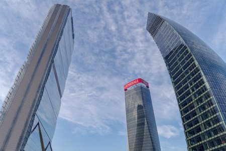 Milan, Italy - January 23, 2022: Skyscrapers Generali Tower (The Twisted One / Lo Storto), Libeskind Tower (The Curved One / Il Curvo) and Allianz Tower (The Straight One / Il Dritto) in the residential, commercial and business district of CityLife in Milのeditorial素材