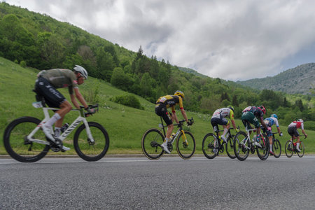 Colle di Nava, Imperia, Italy - May 20, 2022: The peloton passing through mountains landscape of Colle di Nava during the international cycling race 105th Giro d'Italia 2022, Stage 13 a 150km from Sanremo to Cuneo, northwestern Italyのeditorial素材