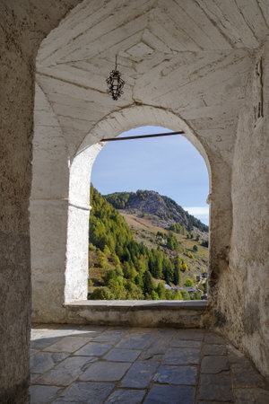 Castelmagno, Italy - October 19, 2021: Ancient arcades passageway in the Saint Magnus of Cuneo Sanctuary, Castelmagno, Piedmont region, Italyのeditorial素材