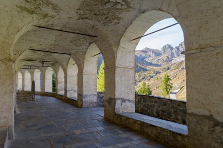 Castelmagno, Italy - October 19, 2021: Ancient arcades passageway in the Saint Magnus of Cuneo Sanctuary, Castelmagno, Piedmont region, Italyのeditorial素材