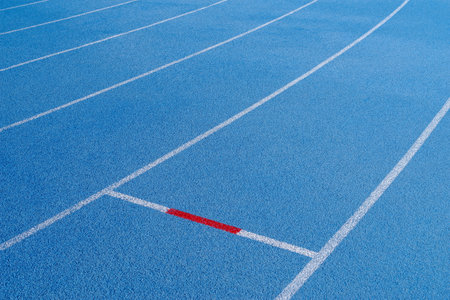 High angle view of lines on running trackの写真素材