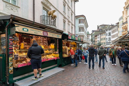 Bolzano, Italy - November 1, 2022: The famous fruit and vegetable market in the Piazza delle Erbe square, Autonomous Province of Bolzano, Trentino South Tyrol, northern Italyのeditorial素材