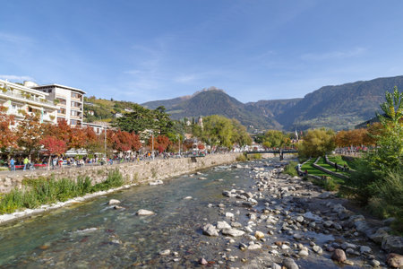 Merano, Italy - October 29, 2022: River Passer flowing along Passer Promenade, Autonomous Province of Bolzano, South Tyrol, Northern Italyのeditorial素材