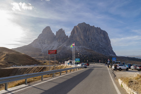 Selva di Val Gardena, Trentino-Alto-Adige, Italy - October 29, 2022: View on Saslonch, Sassolungo or Langkofel group and the Sella pass of the Dolomites, located at 2240 m. Located on the border between the provinces of Trento and Bolzano, it is a popularのeditorial素材