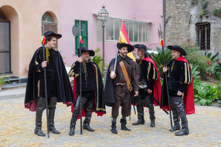 Taggia, Italy - February 26, 2023: Participants of historical reenactment in the old town of Taggia, in Liguria region of Italy. The actors acting out episodes of daily life in settings that evoke moments of life lived fully the seventeenth century. The eのeditorial素材