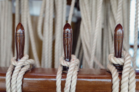Nautical details on boat deck with rope and marine toolの写真素材