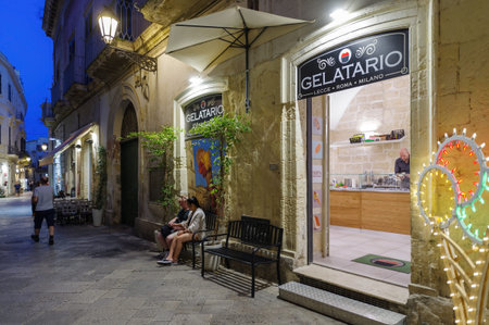 Lecce, Italy - October 30, 2023: Night view the street in the city center of Lecce, Apulia, Italyのeditorial素材