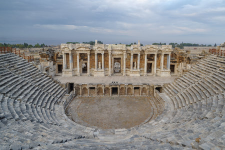 The ancient Roman amphitheater ruins from the 2nd century in the city of Hierapolis, Denizli...