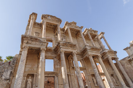 Low angle view of Library of Celsus in Ephesus, Izmir Province, Turkeyの写真素材