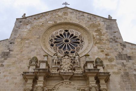 Rose window on the front of the Romanesque Otranto Cathedral, Apulia, Italyの写真素材
