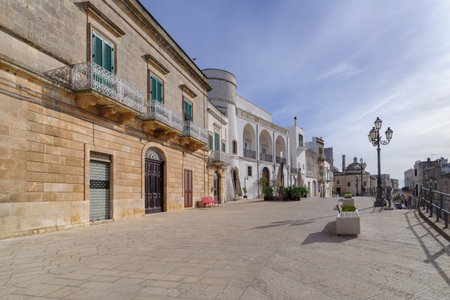 A street lined with white mansions in Cisternino, Apulia, Southern Italyの写真素材
