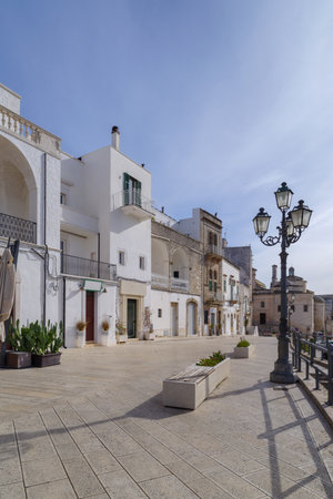 A street lined with white mansions in Cisternino, Apulia, Southern Italyの写真素材
