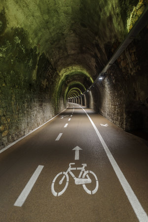 An old railway converted into a bike path in the Liguria region of Italyの写真素材