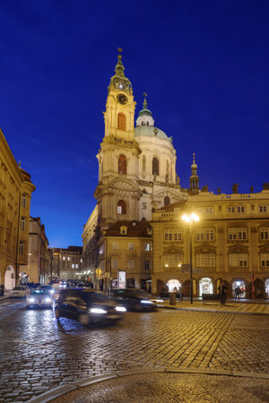 Prague, Czech Republic - 4 November 2025: St Nicholas's Church against famous old street in Mala Strana (Lesser Town) in Prague, Czech Republicのeditorial素材