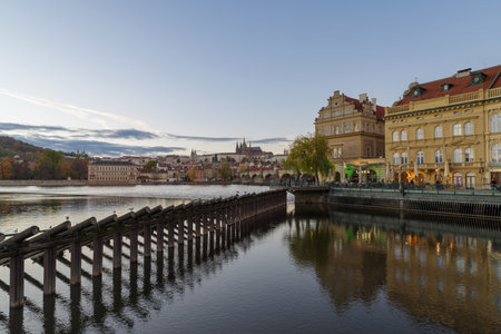 Prague, Czech Republic - 3 November 2025: A view of Castle of Prague and Charles bridge on an autumn day, close before the sunsetのeditorial素材