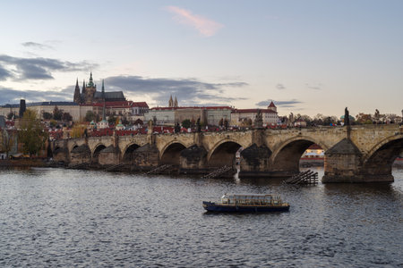 Prague, Czech Republic - 4 November 2025: A view of Castle of Prague and Charles bridge on an autumn day, close before the sunsetのeditorial素材