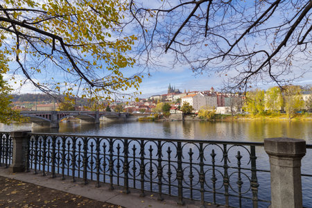 Traditional styled buildings on the banks of the Vltava river in Prague, Czechiaの写真素材