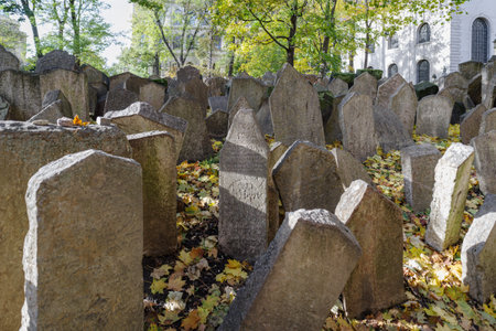 Prague, Czech Republic - 4 November 2025: Old weathered gravestones densely fill the Jewish Cemetery...