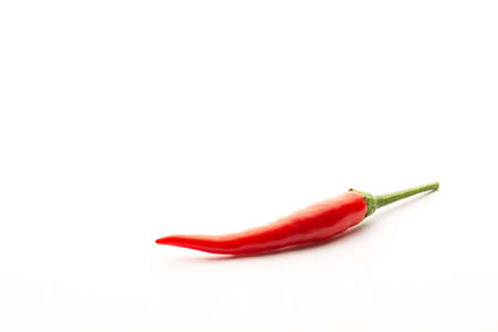 Red chili peppers on a white background. Isolate. Hot peppers. Fresh pod of red pepper.の写真素材