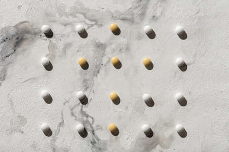 Pattern of pills on the table. Marble surface. Medicines.の写真素材
