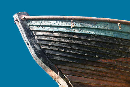 Old boat of a fisherman on shoreの写真素材