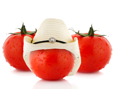 tomato dress a hat, isolated on whiteの写真素材