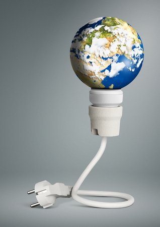 clean energy concept, light bulb with planet Earth and plugの写真素材