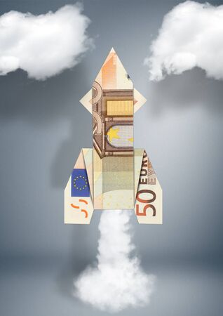 financial business concept, rocket made of moneyの写真素材