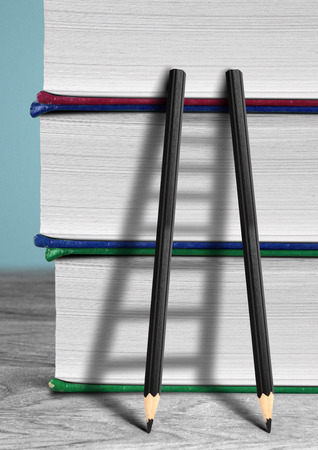 Education concept, pencil Ladder and booksの写真素材