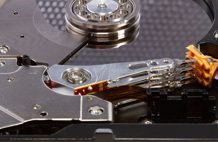 Disassembled hdd disk 3.5 "isolated on white backgroundの写真素材