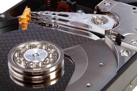 Disassembled hdd disk 3.5 "isolated on white backgroundの写真素材