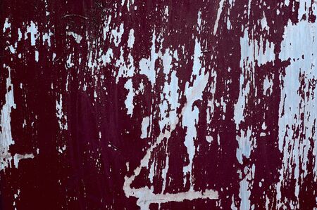 rusty sheet of metal untreated dark burgundy with white shaded spots. shot horizontally. abstractionの写真素材