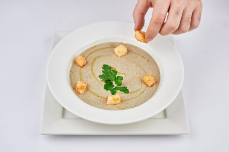 A person holding a plate of foodの写真素材