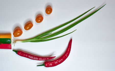 vegetables green onion tomatoes hot chilli background horizontally close upの写真素材