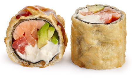 Deep-fried hot sushi roll with salmon, Philadelphia cheese, tomato and avocado on a white backgroundの写真素材