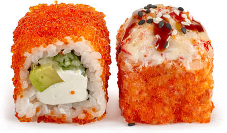Baked sushi roll with crab, Philadelphia cheese, masago caviar, avocado and cucumber with sesame and unagi sauce on a white backgroundの写真素材