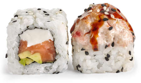 Baked sushi roll with salmon, Philadelphia cheese and avocado with sesame and unagi sauce on a white backgroundの写真素材