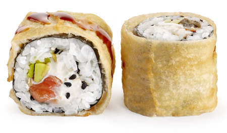 Tempura sushi roll with salmon, eel, avocado, Philadelphia cheese and sesame on a white backgroundの写真素材