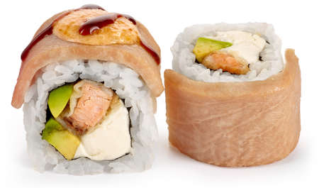 Baked sushi roll with tuna, Philadelphia cheese and avocado with unagi sauce on a white backgroundの写真素材