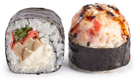 Baked sushi roll with Japanese omelette, Philadelphia cheese, ginger and cucumber with unagi sauce on a white backgroundの写真素材
