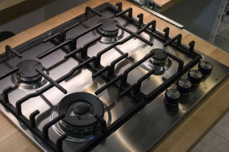 Gas cooker close-up. Kitchen necessity. Four burners. Foodの写真素材