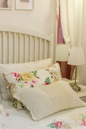bed and pillows in the modern bedroom, white color tone. Interior. Registration of the bedroom. Textile.の写真素材