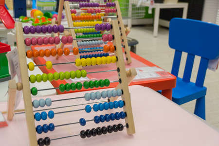 children's abacus on the table. Children's room, game, training. Objectsの写真素材
