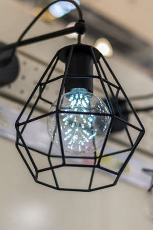 Suspended luminaire with LED bulb lamp. Close-up. Comfort in home.の写真素材